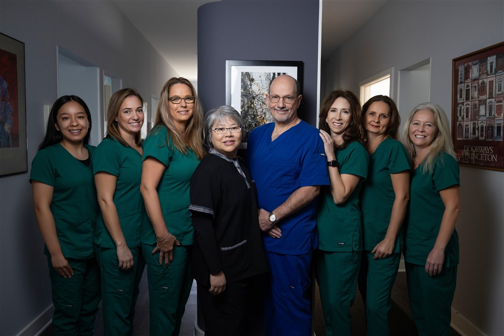 Group photo of the friendly and professional staff at Princeton Prosthodontics, embodying team spirit and patient-centered care.